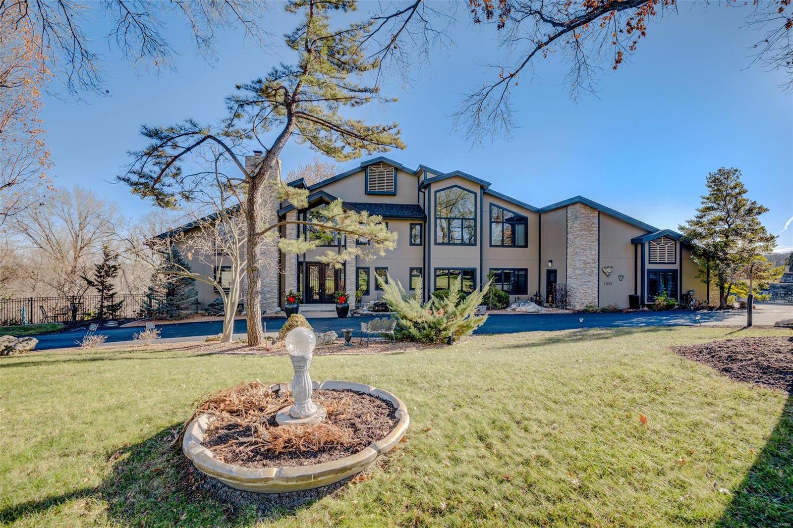 Amazing opportunity to own this one of a kind updated home w/over 6000 sq ft of living space & over 3 acres in a spectacular Chesterfield location. Features include 2 story entry, custom chefs kitchen w/breakfast room, composite deck, hearth room w/built in shelving, hardwood floors, 5 fireplaces, 2 main floor beds, 2 upper level bed/baths including the enormous master suite w/sitting room & private deck, surprise 3rd floor bonus room/bedroom, large finished walkout lower level w/family room, rec room w/bath that would work well as "in-law" quarters, stunning exercise room w/ full bath that walks out to a sunroom w/sauna & ramp to the gunite saltwater pool w/composite decking, fenced yard, inground sprinkler system, circle drive, rear entry 4 car garage, elevator, ADA features & so much more. Newer amenities include roof, custom windows & doors, HVAC systems, Hardie Board siding, driveway & just about all indoor features. This is a "MUST SEE" custom estate you won't want to miss. Some Accessible Features