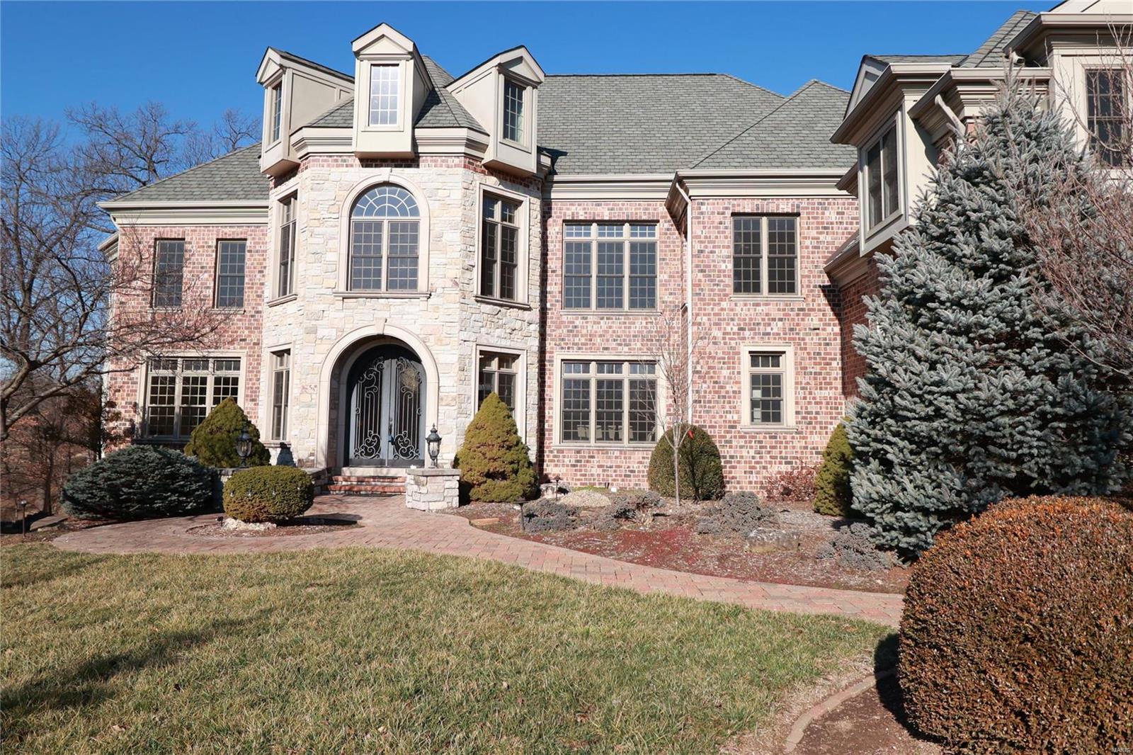 Don't miss this spectacular 7 bedroom, 6 bath beauty with main floor master bedroom.  Extraordinary custom built with over 8100 finished sq. feet which backs to the golf course and balcony facing the golf course.      Everyone will enjoy the beautiful patio with the superior high-end inground salt water swimming pool with self cleaning system and night lighting and pool warmer. The family will love the outdoor bonfire and circular place for Tetherball.     This extraordinary home also features an intelligent Smart home with Control 4 system and Russsound speakers and Ring and myQ mobile app for the garage doors!   Bookcases in the living room and basement stay.  Above ground square footage of the home is 5,765, lower level sq. ft.  is 2335.   Check out more Special Features on this beautiful home under Supplements.   Property is in gated portion of Far Oaks.  Covenants and Restrictions available upon request. Additional Rooms: Mud Room, Sun Room