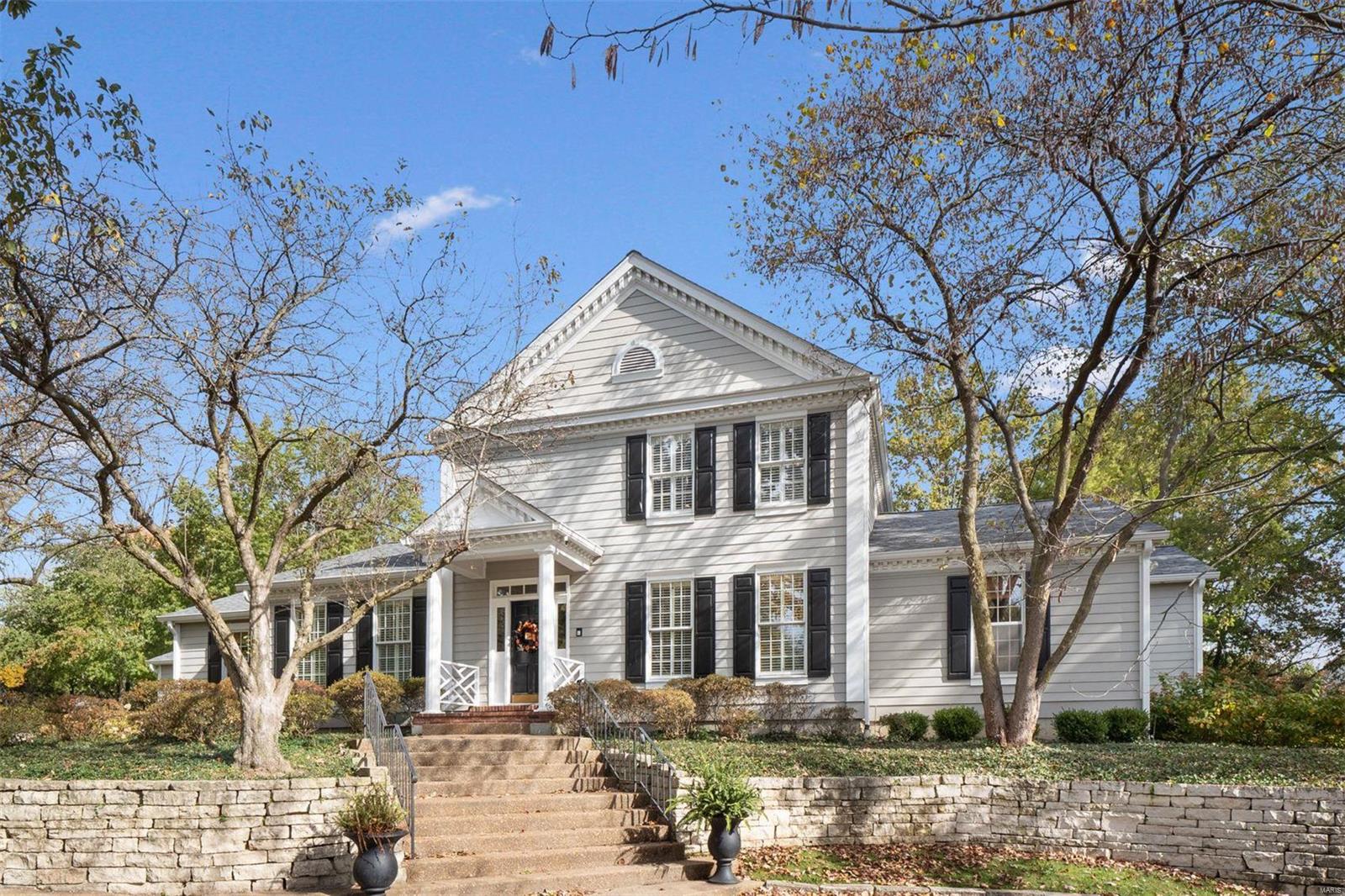 For comparable purposes only.  New England Classic Charm Awaits! WELCOME TO THIS BETTER THAN NEW CHARMING NEW ENGLAND 1.5 sty with master on the main located on quiet cul-de-sac. Private acre lot in Frontenac with beautiful pool and plenty of yard for play. Classic yet modern lifestyle with new smashing kitchen and updates throughout.  9 ft plus ceilings  and private master suite on main with a study adjacent. Wonderful family room w  frpl and opens to patio/pool. Main flr laundry and 3 car garage.  Gleaming hardwoods and neutral decor enhance this beauty.  Second flr w 3 beds and 2 full baths.  One ensuite.   Fin walk out LL with access to yard ideal for a kids private entertaining space. Circle drive in front.  Newer roof, driveway, land, retain wall, built-in bbq, 2 new hvac, 2 new water heaters, updates to pool NEW kitchen and decor throughout.
