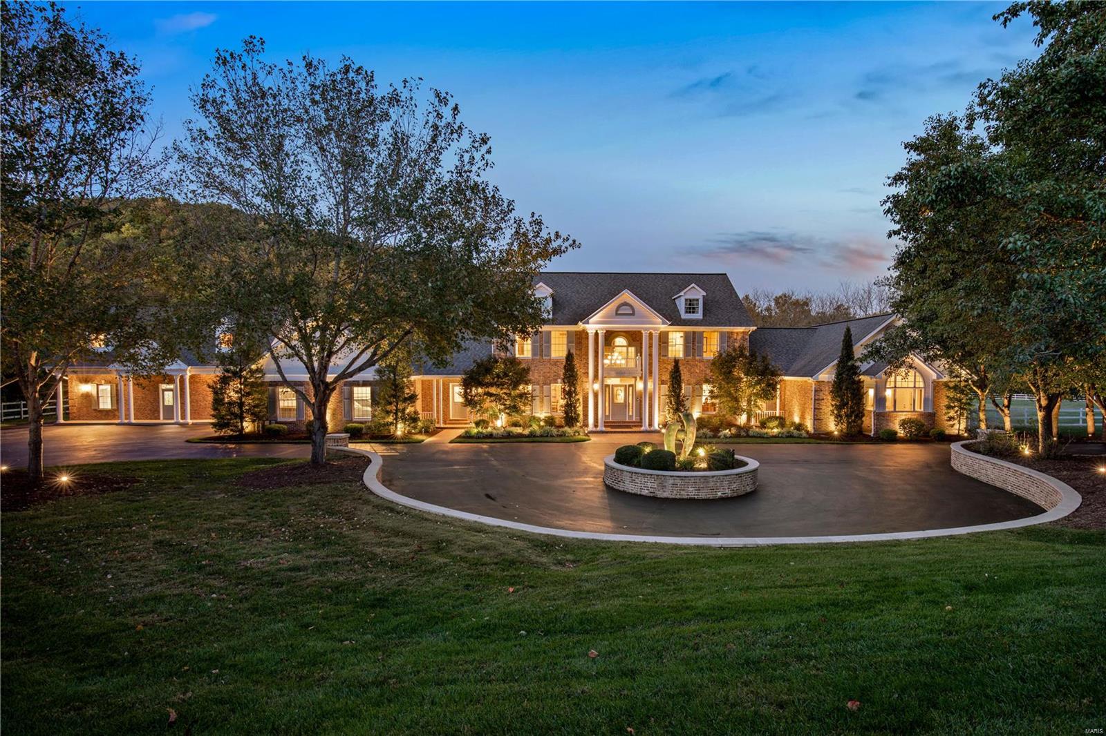 Spanning 8.24 Acres, this Beautiful Resort Style Property offers Vacation Living at its Finest! Rockwoods Reservation provides a spectacular backdrop for this property, which has undergone a near complete renovation since 2006. This oasis offers a large estate home, separate guest house, 6-8 vehicle capacity garage space, inground Pebble Tec heated pool with waterfall, lighted sports court, pond with fountain, spring house, large outdoor living space with gourmet outdoor kitchen, wraparound deck and 4 golf tees and holes, all situated on 8 beautiful fenced acres. The home and guest house offer 5 bedrooms, 8 baths and a total of 9,211 SF of finished living space. The 1.5 story home offers large spacious rooms, glass sunroom overlooking the pool and picturesque property, 2 master suites with ensuite spa baths, 2 laundry areas, and an exquisite media room / theatre. Additional Rooms: Sun Room