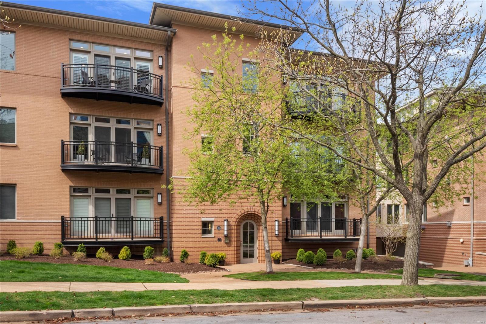 An amazing find, completely renovated 1.5 story Clayton penthouse with 3 outdoor spaces.The main floor features a stunning living room with gas fireplace, tray ceiling and built-ins leading to the 1st balcony. The kitchen is a gorgeous masterpiece with custom cabinets, center island, Wolf induction cooktop, Subzero, granite counters and backsplash. The main floor master suite offers his and her master baths each with a walk-in closet and 2nd balcony.  Upstairs 2 loft areas one area with a wet bar, perfect for a family room and the 2nd area could easily be an office. Additionally, there are two bedrooms connected with a jack and jill bath.  All leading to an amazing 18x11 rooftop terrace a coveted amenity.  The home has been thoughtfully renovated with no detail spared including hardwood, carpeting, hardware, lighting, paint, HVAC and more. Located on one of Clayton’s most sought after streets just steps to Shaw Park, restaurants. Truly an exceptional place to call home. Location: Corner Location, End Unit, Upper Level