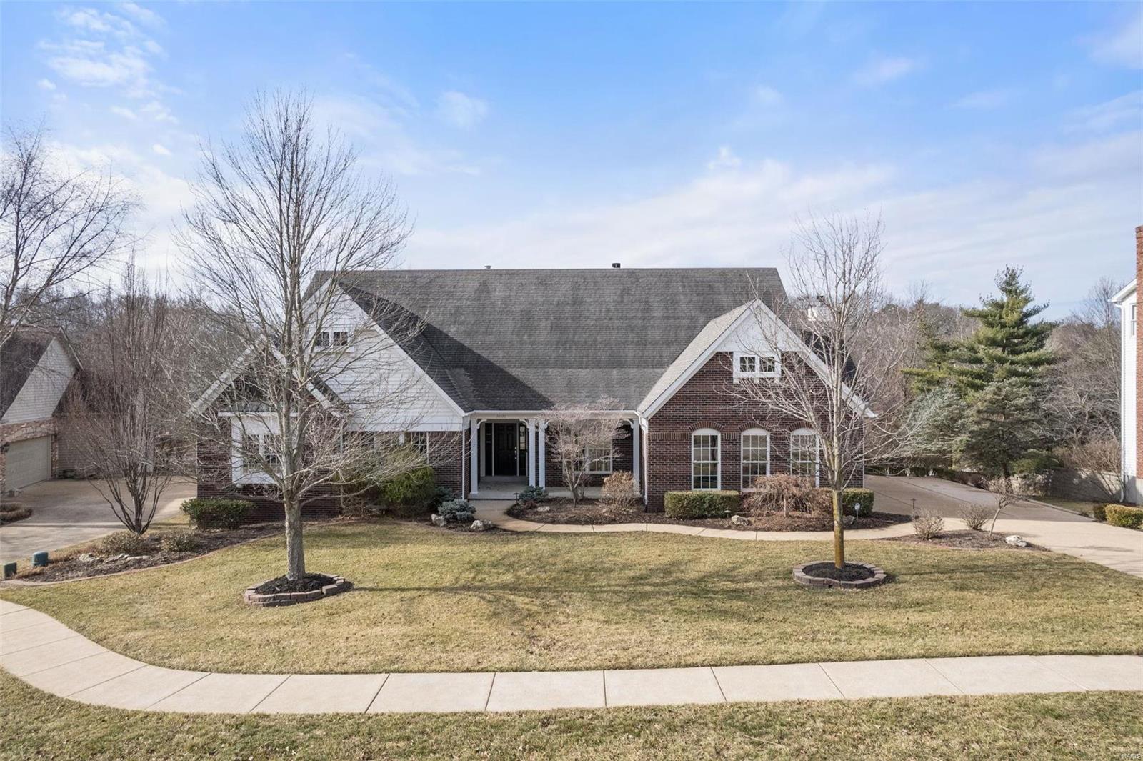 Welcome to Summer Blossom Lane!  Natural light streams in everywhere in this open ranch floor plan.. divided bedrooms on the main level, & connected kitchen/breakfast and hearth room with stone gas fireplace offer stellar gathering spaces!!   12 ft ceilings, built in bookcases, custom moldings and a 2nd gas fireplace in the main level great room. Gracious dining room off the foyer and open to the great room add to an entertainers dream spaces!  This 5200 plus sq ft, [both levels combined]  offer features to include theatre room [yes the cozy chairs stay!], wine cellar, LL exercise room, , LL  bonus room, a spacious 4th LL bedroom and TWO full baths in LL PLUS a large rec/family room & kithcenette area!!  The walkout LL leads you to a Baker pool, hottub, and beautiful deck!    Double ovens, granite countertops, gas range,  wine cooler, new Cafe built in microwave, accent the kitchen! The 3 car side entry garage, cul de sac setting and Parkway Central Schools add to the list! Additional Rooms: Mud Room, Wine Cellar