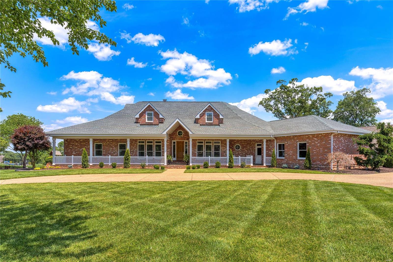 This full-brick J L Wise-built ranch home features well-proportioned rooms with soaring ceilings, detailed trim work & oak hardwoods that extend throughout the main living area. Impressive entry foyer leads to formal living & dining rooms & stunning great room with dimensional ceiling, marble fireplace flanked by built-in bookcases & dramatic bow window that overlooks the 14th & 15th holes on the South course. Chef’s kitchen with natural cherry cabinetry, premium appliances, 6’ center island & convenient planning center adjoins breakfast room with wide bay window & light-filled sunroom. Spacious primary bedroom suite with luxury bath with jetted tub & 2 additional bedrooms with Jack n’ Jill bath complete the main floor living quarters. Lower Level entertainment space includes recreation room, game room, family room with fireplace & indoor pool plus 2nd kitchen, 4th bedroom & 2 full baths. Golf community lifestyle with access to clubhouse, pool, tennis courts & championship golf course. Additional Rooms: Sun Room