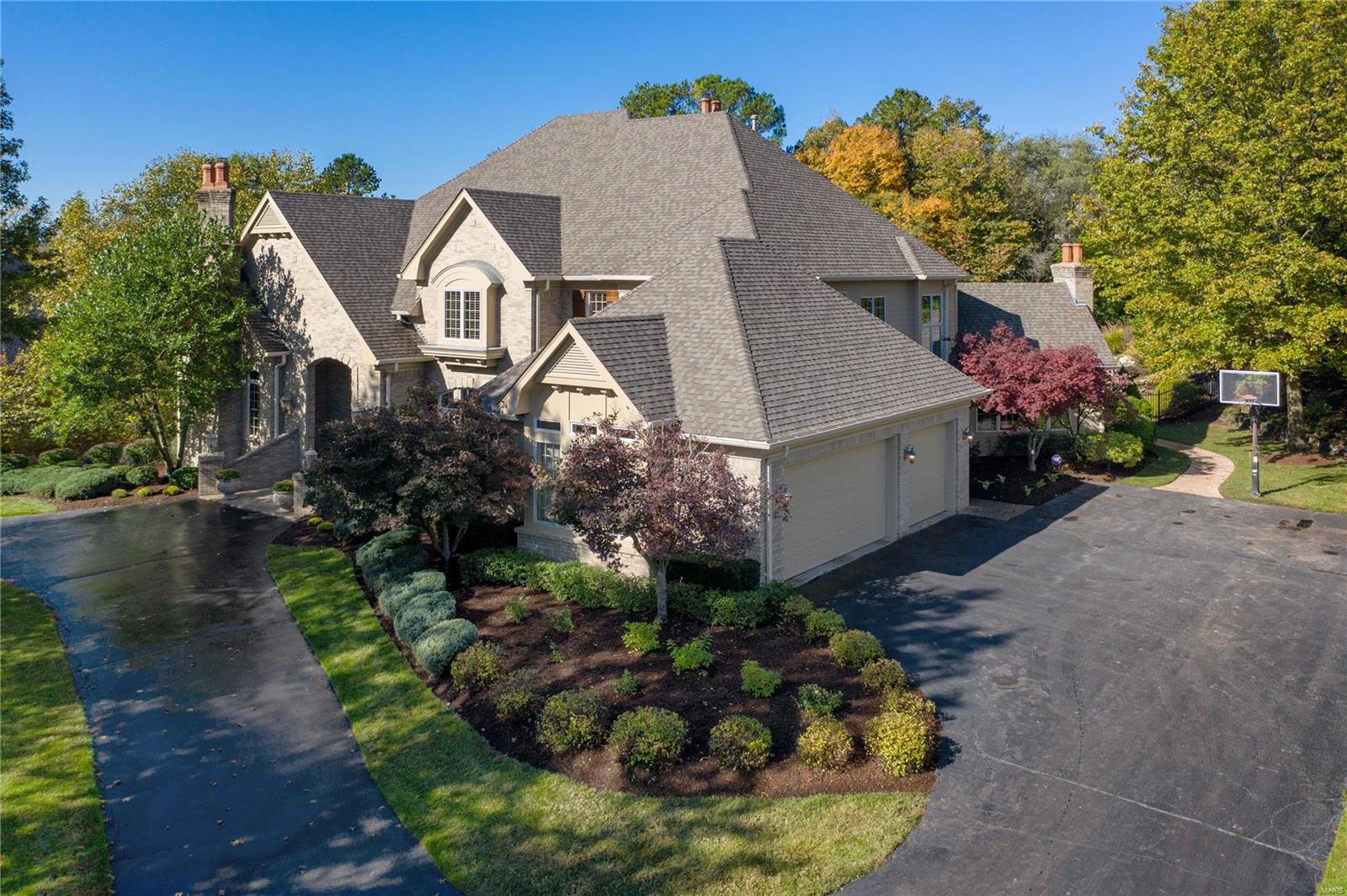 Offering 8,715 total sqft including fabulous finished lower level, situated on 1 professionally landscaped acre, located in desirable Pointe Conway gated community in Town & Country - this beautiful home is a must see! Boasting neutral decor and offering all the spaces desired for today’s lifestyle: 2 story entry w/circular staircase, dining room w/wood floors, home office w/wood paneling, built-in bookcases, fireplace, 2 story great room w/fireplace & wall of windows, 2 story kitchen w/center island & breakfast room, open to hearth room w/vaulted ceiling & fireplace, open to sunroom w/octagonal wood ceiling, master bedroom suite w/sitting area, master bath w/whirlpool tub, double stall shower, powder rm, laundry rm/half bath complete main level. 2nd Level: 3 additional bedrooms, 2 full baths. Walk-out lower level: recreation rm w/fireplace, bar w/kitchenette, exercise rm, billiard rm, hot tub rm, home theatre, half bath, full bath. Pool, waterfall, fire pit, fenced yard. 3 Car garage. Additional Rooms: Sun Room