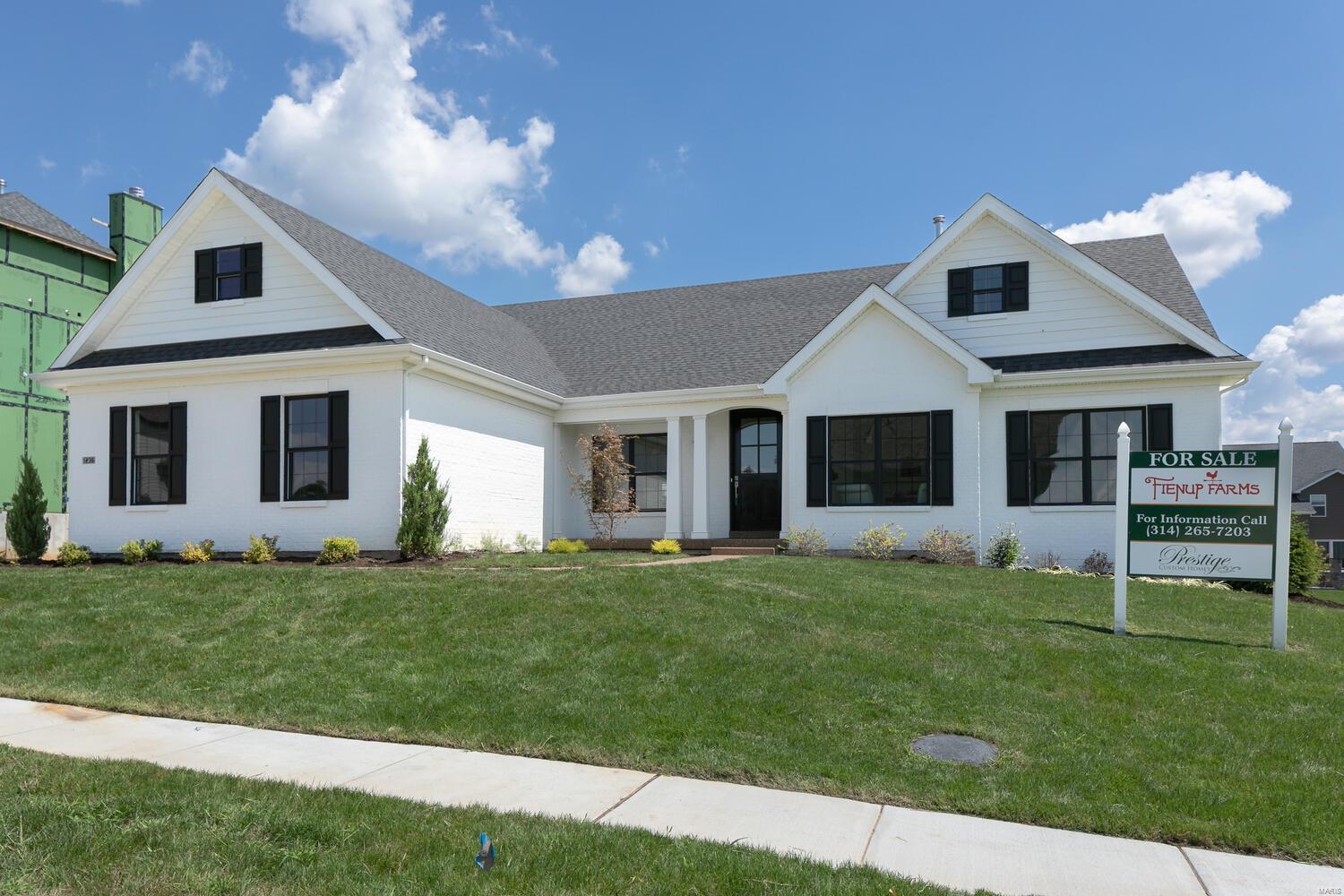 Just completed beautiful open ranch plan in the Premier Chesterfield community of Fienup Farms.  This 4 bedroom and 4.5 bath home boasts a 3 car side entry garage, 9' foundation pour, 9' first floor ceilings with vaults/coffers, covered deck with fireplace, custom cabinetry, Wolf/Sub-Zero Appliances, Quartz countertops, extensive trim work, wood floors, wet bar, great room fireplace and much more.