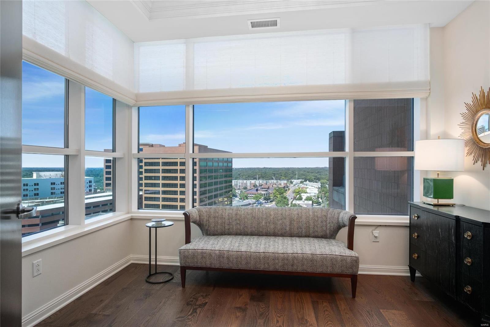 The grandeur of simplicity with lofty 10th floor views in the heart of Clayton! This condo has been completely renovated from top to bottom by interior designer, Kelly Johnson - offering clean lines, simple palette and an elegant & functional space. One of the few renovated 3 bdrm / 4 bath units with just under 2,900 sqft of living space. Lovely entry foyer with expansive floor to ceiling views & living spaces that top any in contention. Renovated kitchen open to DR and FR with loads of windows. Primary suite with updated bath, walk-in closet, plus room for sitting area overlooking urban lifestyle below. Two additional bdrm suites plus a half bath & a laundry room - all completely renovated and modernized for today's discerning buyer. Remote blinds, custom lighting, and so much more. Owners have intelligently utilized every inch of space & have revitalized the home with a sense of style that will not disappoint. Walk to restaurants, shops, world-renowned schools & business district. Location: End Unit, Upper Level