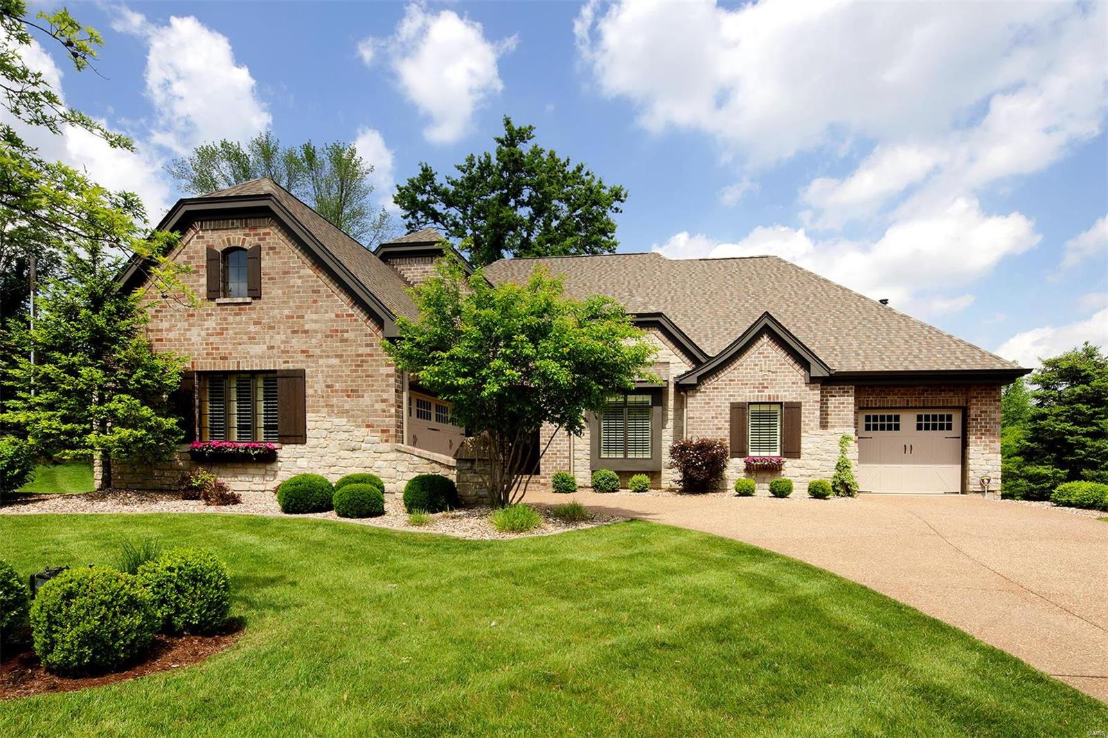 Handsome, sophisticated newer home with all the amenities buyers are looking for today. Conveniently located in the highly rated Ladue School District, flexible and open floor plan and wonderfully private outdoor spaces. The main floor master has a coffered ceiling and luxury bath. Two bedrooms and bath are on the 2nd floor and another bedroom and bath is in the walk-out lower level. The gourmet kitchen has high-end stainless appliances, granite and limestone, island breakfast bar, two pantries and a breakfast room. The main floor also has a dining room, office/den and 2-story vaulted greatroom that opens to a covered deck with fireplace. The lower level also has a media room, wine tasting room and a family room that opens to a very private patio with beautiful stone walls and a firepit. The nearly 1/2 acre lot is lovely. There are laundry hookups on all 3 levels and garages for 3 cars. This is a great house and a real find.