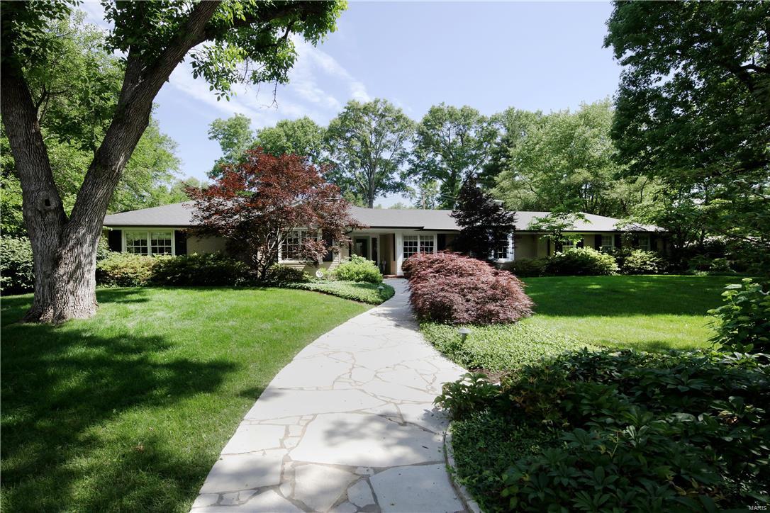 Back on Market.  No fault of house or seller.  Gracious sophisticated one story home on perfectly landscaped .75 acres in Ladue.  This spacious home offers an inviting living rm with gas fireplace, light filled family rm with vaulted ceiling, newly added all seasons room with vaulted hardwood ceiling and 3 sides of windows overlooking the professionally landscaped gardens.  The spacious designer kitchen offers, large center island with hardwood top, custom cabinetry, honed marble tops throughout and stainless steel appliances including Wolf gas range.  A spacious dining rm with sitting area, main floor laundry, 4 bedrms (one currently being used as an office), 2 hall baths and a nicely appointed master suite tucked away at the end of the hall, complete the first floor.  The low lev is partially finished with partial bath,  office space and lots of storage.  This home has been meticulously maintained and delights with flagstone walkways, deck, irrigation sys, 2 car gar and more.