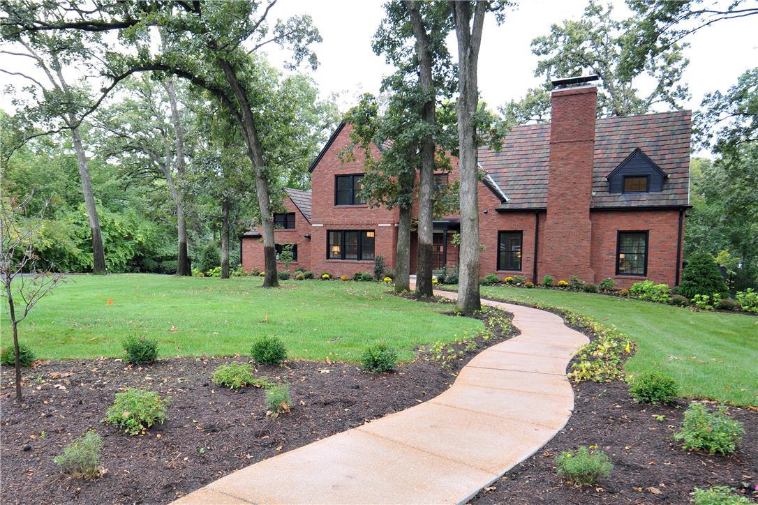 Classic design meets modern amenities in this stunning two-story Ladue retreat.  Top-to-bottom renovations and thoughtful details make this custom home the perfect space to gather or unwind.  Privacy is yours in this stylish complete remodel just a stones throw from Tilles Park. Beautifully updated throughout, this 5 bd /5.5 bath home with 3,757 sf sits on almost an acre with a generous sun room overlooking picturesque yard and pool area. A gourmet kitchen with stainless appliances opens to a sunny four seasons room on one end, and a cozy hearth room on the other, making it truly ideal for daily living and entertaining. Upstairs, the master suite is a luxurious getaway w/ huge master shower  w/ electronic control & designer finishes. Three additional bedrooms & a full bath open to a central landing. This house also features a stunning guest suite w/ plenty of privacy.  Other features include 2nd level laundry, ample closet space and storage, and a stunning slate roof. Great New Price!! Additional Rooms: Sun Room