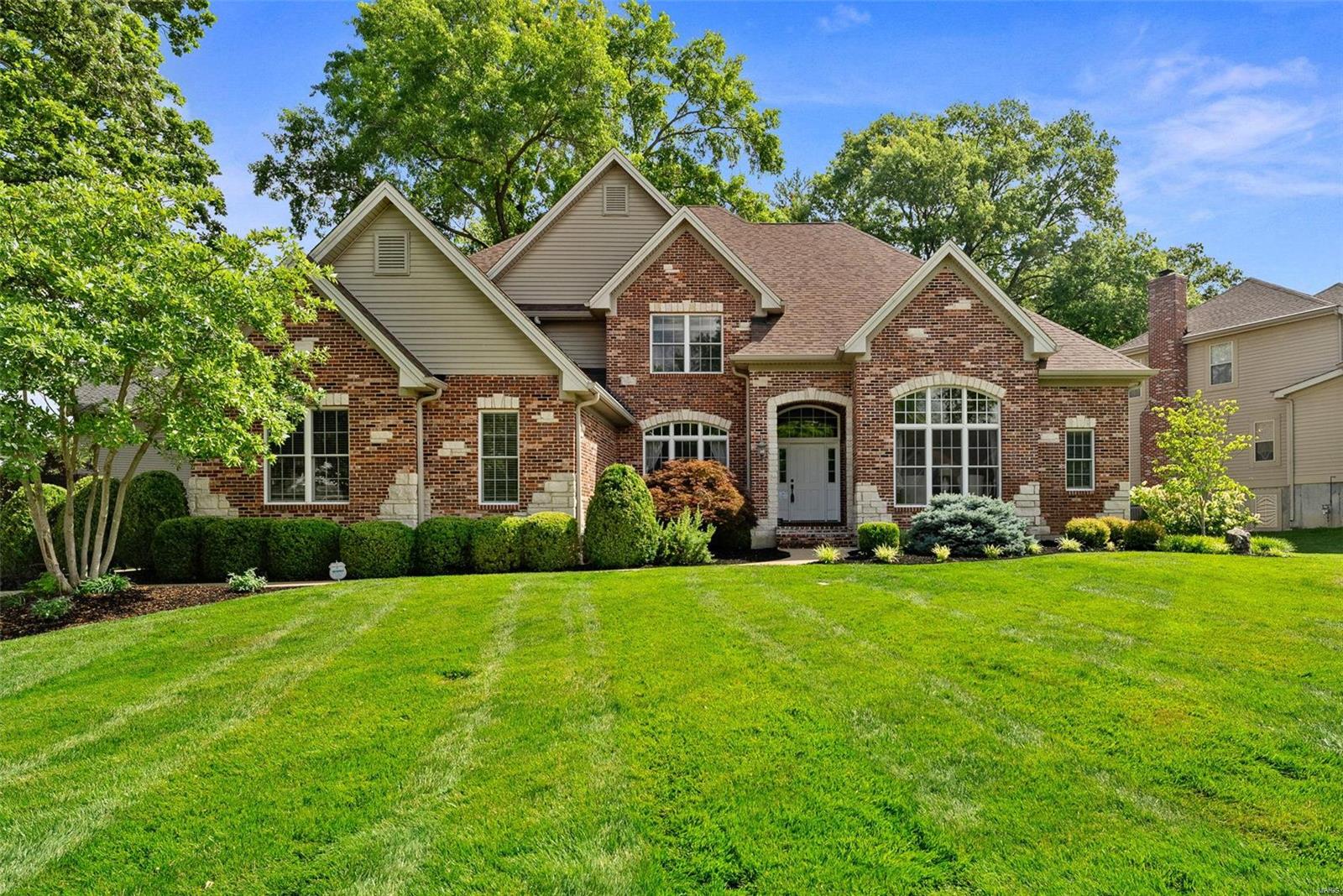 Nestled in the sought-after Harwood Hills in the heart of Des Peres, impressive Serama boasts over 5k sqft of finished living space, on a beautifully-landscaped .5 acre, in the award-winning Kirkwood schools. This handsome property epitomizes good design, masterfully combining comfort and elegance. Features: 5 bdrms, incl a spacious MF primary suite w/spa bathroom and palatial closet. The MF boasts a light-filled open floor plan ideal for entertaining w/lovely details from soaring ceilings and custom millwork to the chef’s kitchen of your dreams.  Heading upstairs, the 2nd floor features 3 sizable bdrms and 2 full ba. The LL is guest-friendly w/a proper egress bdrm, full ba, cozy rec room w/gas FP, and oodles of storage. Other features incl a MF laundry, 3 car garage, private home office w/French doors, and a fenced backyard. Complete w/new roof, HW floors, newer systems/appliances, security system, 3 gas FP, and yrs of documented maintenance records... too many updates to list here!