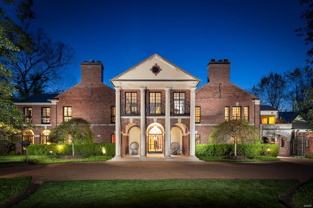 Magnificent Maritz and Young designed home situated on a breathtaking 1.45 acre lot in the heart of one of Clayton's finest neighborhoods.  The grand entry hall unites a spectacular, light filled living room and sun room with a gorgeous dining room.  Walls of windows throughout the house bring the outdoors in.  The splendid hallways with gleaming terrazo floors upstairs and down provide elegant space for entertaining as well as for intimate gatherings.  Upstairs, the master bedroom suite is an oasis with a large, cozy sitting room with a fireplace and walls of bookcases, a dressing area and a lovely bedroom.  There are 4 additional bedrooms, a home office, a full apartment for guests, a small 1 bedroom carriage house apartment and 6 garage spaces.  French doors throughout the house open to a lovely, brick terrace, glorious gardens and a kidney shaped, heated swimming pool.  A most special opportunity.