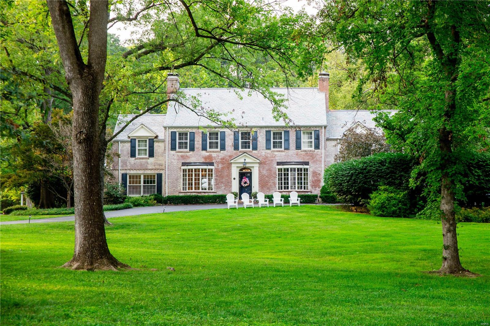 The luxury Frontenac estate you have been waiting for on the most prestigous street in Saint Louis....Countryside Lane. One of kind traditional masterpiece on private 1.5 acre park like grounds with an outdoor oasis. This tastefully updated estate features 4 bedrooms + 6 bathrooms and over 5700 sf of living space. Enter the park like setting into the beautifully appointed foyer w/grand center staircase open to the formal dining room and living room. The bright chefs kitchen features oversized windows, custom cabinetry, and attached breakfast room w/fireplace. The expansive family room offers a custom bar, wood burning fireplace and access to the screened in sunroom and outdoor oasis. Upstairs features a large master suite with en suite bathroom and 3 additional bedrooms and baths. The stunning backyard features a large pool, brick patio and beautifully manicured grounds. Finished LL features a rec room and bath. Detached 3rd car garage. Ladue Schools. Don't miss this rare opportunity!