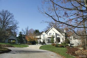 PLEASE NOTE SUBSTANTIAL PRICE REDUCTION !!
This exceptional custom home is situated on 1.5 acres in the heart of Ladue. Spacious rooms are highlighted by superior finishes & millwork. Special features include *gourmet kitchen w/ designer appliances, breakfast rm, delightful hearth room* Master suite w/ private balcony, luxurious bath w/ heated floor,* Stunning, light filled great rm w/ impressive stone fireplace* Charming four season rm* Butlers pantry, office and laundry rm. There are three bedrooms on the second floor each w/private bath & heated floor, a second laundry area, plus a guest/in law suite w/kitchen. The w/o lower level includes a family rm, rec rm, bar area w/wine cellar, theater, ofc, work out rm, & a half bath & ample storage. All on a wooded lot w/patios, stream, & pond. Perfect for entertaining & family living. Possession early Dec. preferred.  Sitting rm dimensions = 4 season rm. Den dimensions = first floor office. Office in lower level 22x15.