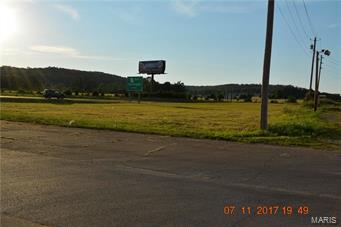 Don't miss out on this rare opportunity to buy a PRIME PARCEL OF LAND in an incredibly fast growing city. This parcel has 14+ acres in the Heart of Farmington with Highway 67  frontage. ( OWNER WILL DIVIDE ) Many Big Business's are moving to this FAST growing city. Don't miss out on this one. Don't wait! Call for your showing Location: City, Corner Location, Downtown, High Traffic, Hwy/Interstate Frntg, Retail Center