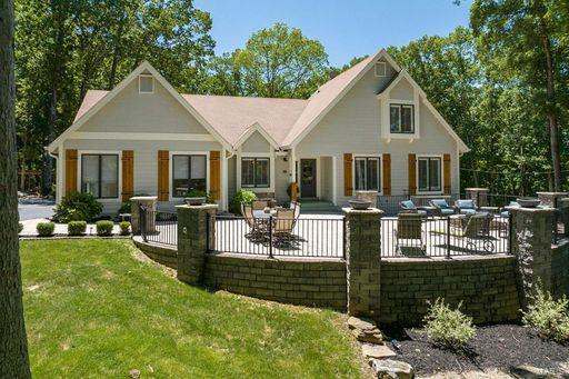 The picturesque setting of this completely renovated 3 acre estate will completely amaze you! From the moment you drive up a private oasis awaits you w/breathtaking views of all NEW landscaping plus scenic views & newly built steps lead to the stocked pond w/a dock plus a front paved patio w/a built in firepit, tranquil fountain, space for entertaining & enjoying time outside. Newly built outdoor walking paths around the property, deck, pergola w/built in picnic table, golfing mat, utility shed w/potting bench. Entering the home you are welcomed with an all NEW open and modern farmhouse design throughout inc hdwd floors, vaulted ceiling w/wood beam, shiplap feature walls, plantation shutters, french doors to sun room, Anderson casement windows, 
CHEFS kitchen w/11 foot quartz island, floating shelves, ALL Frigidaire SS Prof Appl, custom vent hood, mn floor laundry, addtl half bath, primary bedrm w/ensuite & a 2nd bedroom w/a full bath top off the main floor. PLUS a w/out fin LL! Additional Rooms: Mud Room