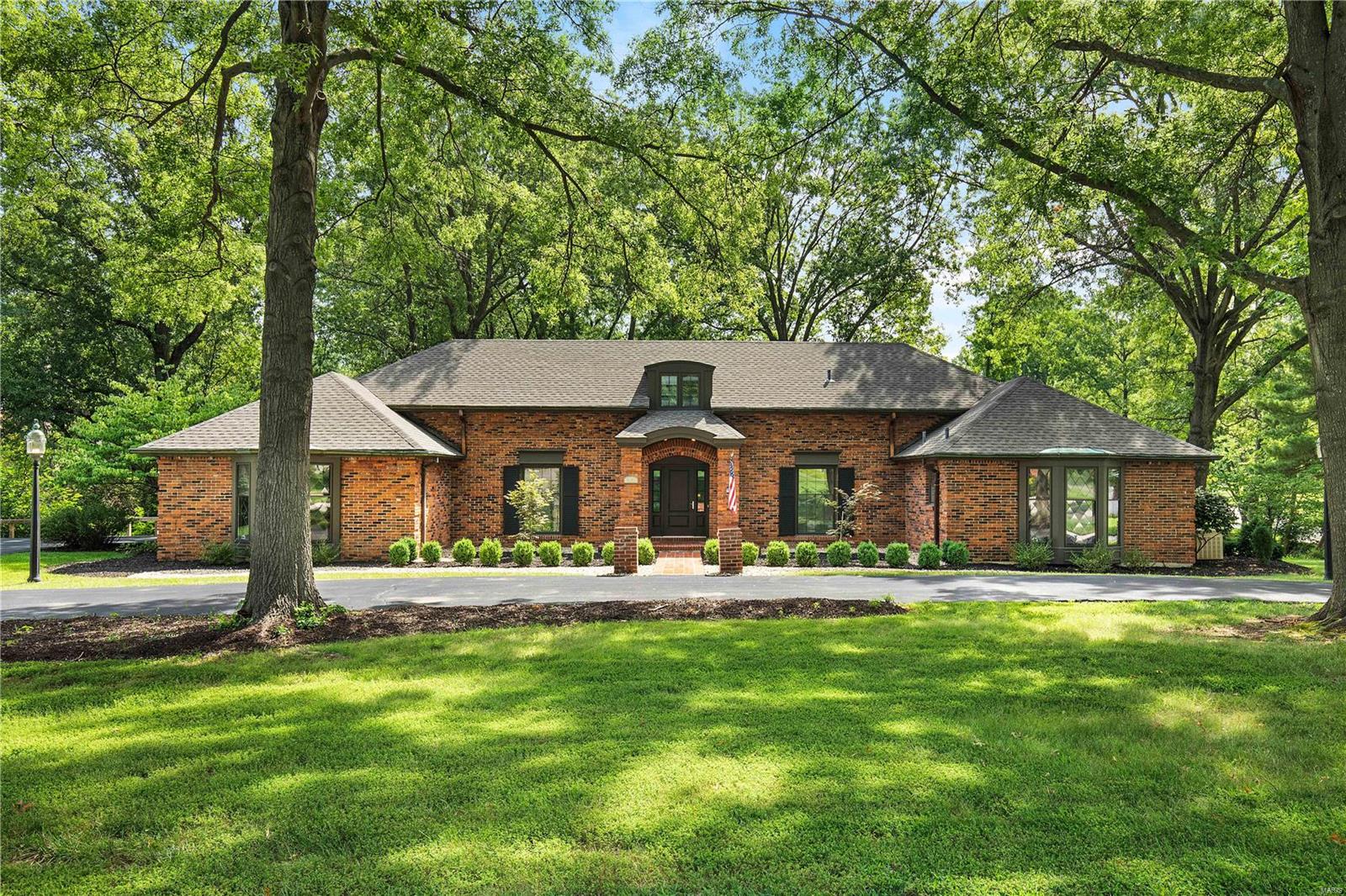 Wonderful story and a half renovated home. Large secluded master suite. Desirable open floor plan great for entertaining. Kitchen features custom cabinetry with granite counter tops, over sized island, walk-in pantry, tiled backsplash, and more. Appliances include, double ovens, gas cook top,, and drawer microwave. Kitchen opens to family room with vaulted ceiling, large gas fireplace, and breakfast room which leads to a large back deck. Spacious mudroom with custom cubbies. First floor laundry room. Master suite with coffered ceiling, fireplace & huge walk-in closet. Master bath features freestanding tub, his and hers vanities with granite tops, enclosed toilet area, linen closet, heated tile floor, and an over-sized shower with a bench seat, body-sprays, wall-mounted and hand-held shower heads. Finished lower level with a wet bar & beverage center. Newer HVAC systems, whole-house generator, and more. Two rear decks overlook creek on a private lot. Additional Rooms: Mud Room