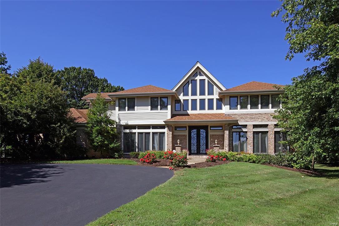 $50,000 REDUCTION! Ladue Schools w prime Creve Coeur location. Private, Level Lot with more than 30 Trees, on more than 7/10 acre.  3 Bedrooms have New Carpet (12/26/17).  4 Bedroom, 7 Bath home has a Designer Chandelier that showcases the Foyer, w/ Custom, Real Wood flooring, cathedral ceilings and stone fireplace. Top of the line Chef’s Kitchen with many amenities, upgraded built in appliances, 6 ft Sub Zero Fridge, Ice Maker, Serving Island, newly remodeled walk in pantry, custom lighting, New marble flooring, opening up to the sunroom.   Mn Flr Guest suite, w/ new carpet and updated, tiled bath with granite.  Upstairs Mstr Suite has private sitting room, spa bathroom w/ raw wood cabinets, jetted tub, and glass tile surround.  Library w/ extensive built ins.  Two more bedrooms, one w/ NEW carpet, tiled, updated bathrooms, one w/ granite.  Finished LL w/ Fam Rm,  Kitchen/Bar, Sleeping Area/Office, and Full Bath.  5100 TLA, 3800 abv. Non Smoking and Pet Free.  New High Efficiency AC.