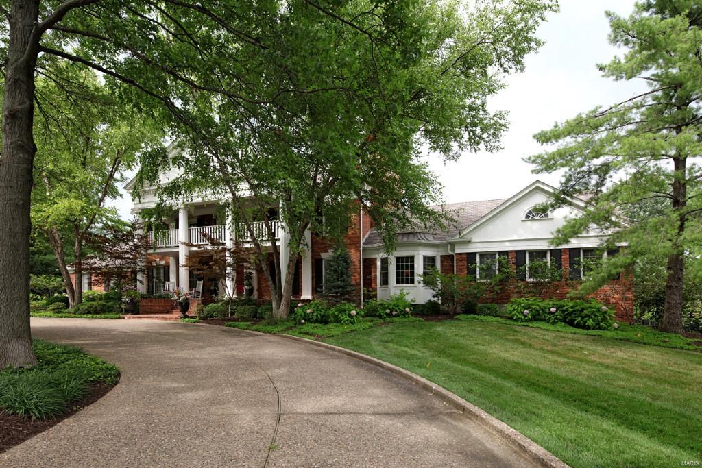 SENSATIONAL PRICE REDUX...$200,000+ LESS THAN ORIGINAL LIST!!  Freshly painted rooms in soft neutral tones create a new fresh appeal!!! Majestically situated on an acre lot graced with beautiful gardens ..the ambiance is set! Grotpeter built, the elegant interior features over 7000 sq. ft. of  upscale living w gracious rooms & intricate architectural details! The heart of the home is the richly appointed gourmet kitchen w oversized sub-zero refrig/freezer, brick cook surround, Viking 48" double oven & gas cooktop plus adtl oven.. bayed hearth room opens to a  screened porch overlooking the gorgeous kidney shaped pebbletech pool. A handsome wood paneled, box beamed family rm w wet bar bridges the kitchen. The m/f master retreat features an executive office/den, sitting room & stylish bath with jet steam shower.  L\L rec room/billiard rm, wet bar, sauna, craft room .. 4 car garage. Special Financing Incentives available on this property from Sirva's preferred lender..SIRVA addendum recq.