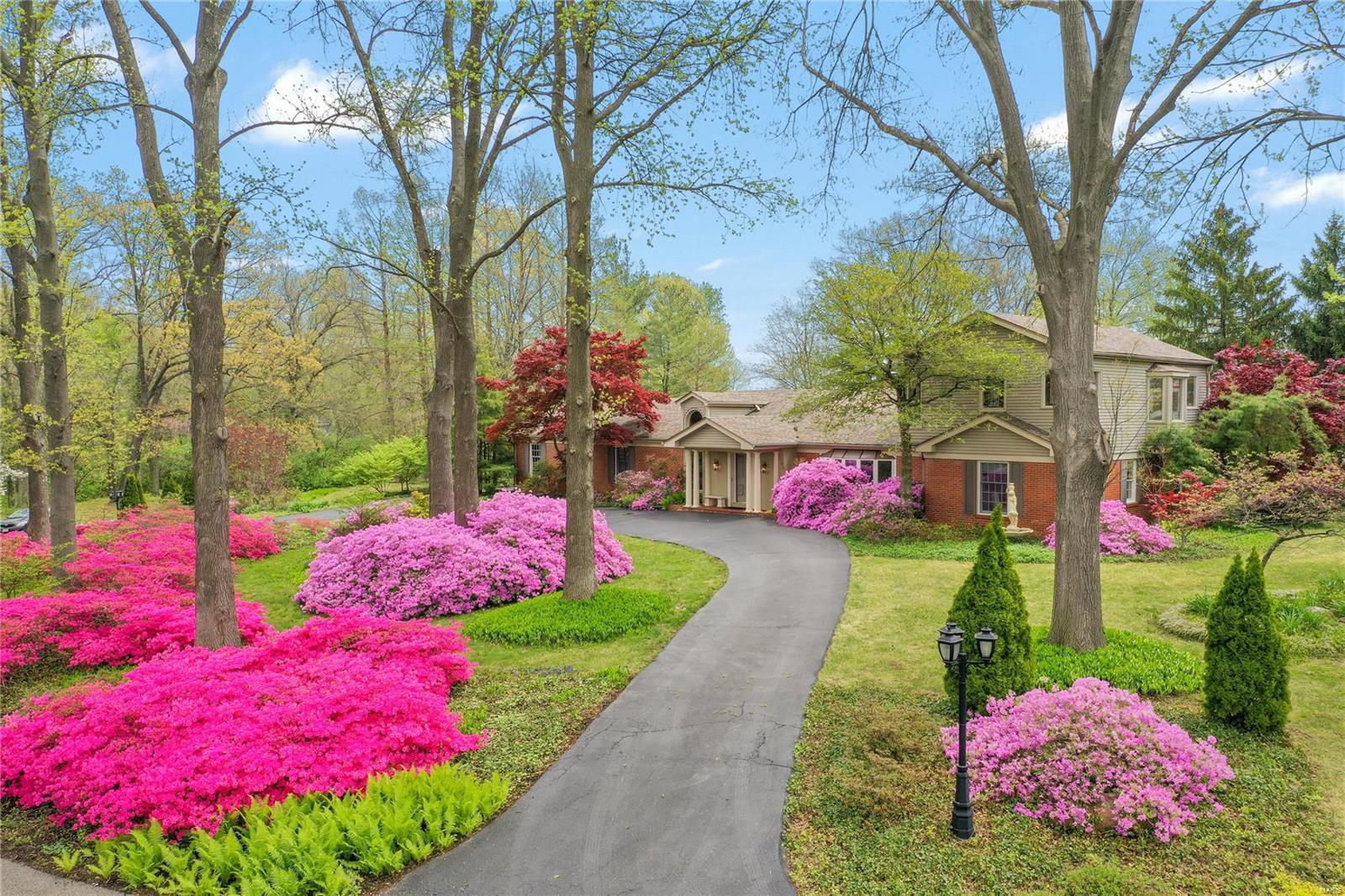 Secluded in the village of Westwood, sits this sophisticated & contemporary 1.5 story home. The sense of seclusion is amplified as you make your way onto the parklike setting of this distinctive 1.2 acre property. No detail was overlooked in the peaceful & serene Robert K Kruger designed landscape: wraparound cedar deck overlooking the low maintenance koi pond; slate lined streams w/ waterfall; & walking paths through the perennial native landscape. Inside, you’ll find a beautifully maintained open floor concept. The vaulted great room w/ gleaming wood flrs & marble gas fireplace opens to the sleek kitchen & dining. Just off this space is the spectacular glassed-in pool opening to the deck & gardens — talk about magical resort living! There are 2 primary suites: one on the main along w/ additional guest room suite & another on 2nd flr w/ vaulted ceilings, sitting rm & private deck. Come see why this home has been featured on many gardens tours and described as Heaven on Earth! Additional Rooms: Sun Room