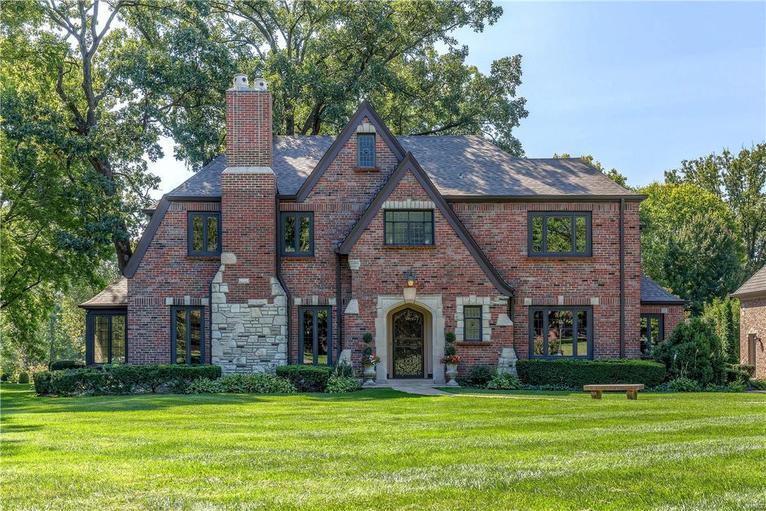 Just completed kitchen and bath updates by Glen Alspaugh! Outstanding architectural appeal inside & out!  This beautiful 4+ BR home has wonderful 2 sty addition of breakfast room & family room on the main level off the kitchen, large master bedroom suite upstairs, plus 3 car attached garage!  Built-in cabinetry & fplc in fam m.  Striking moldings and arches.  Lovely sunroom is 3 season.  Main flr office! Kitchen has custom Markus 42 inch cabinets & island w quartz counters & brkfst bar.  Viking gas cooktop & dbl ovens, SubZero refrig & Miele dishwasher. Upstairs find 4 spacious BRs & bonus rm & sitting rm. Front and back stairs. LL has knotty pine rec room w stone FP and BR & bath could be great for nanny w separate exit. Pella windows & doors bring in so much natural light & give wonderful views of the special lot, flagstone patio w fountain & stunning landscaping. Amazing storage w basement under original home & addition, many organized closets (2 walk-ins in master) & walk up attic. Additional Rooms: Mud Room, Sun Room