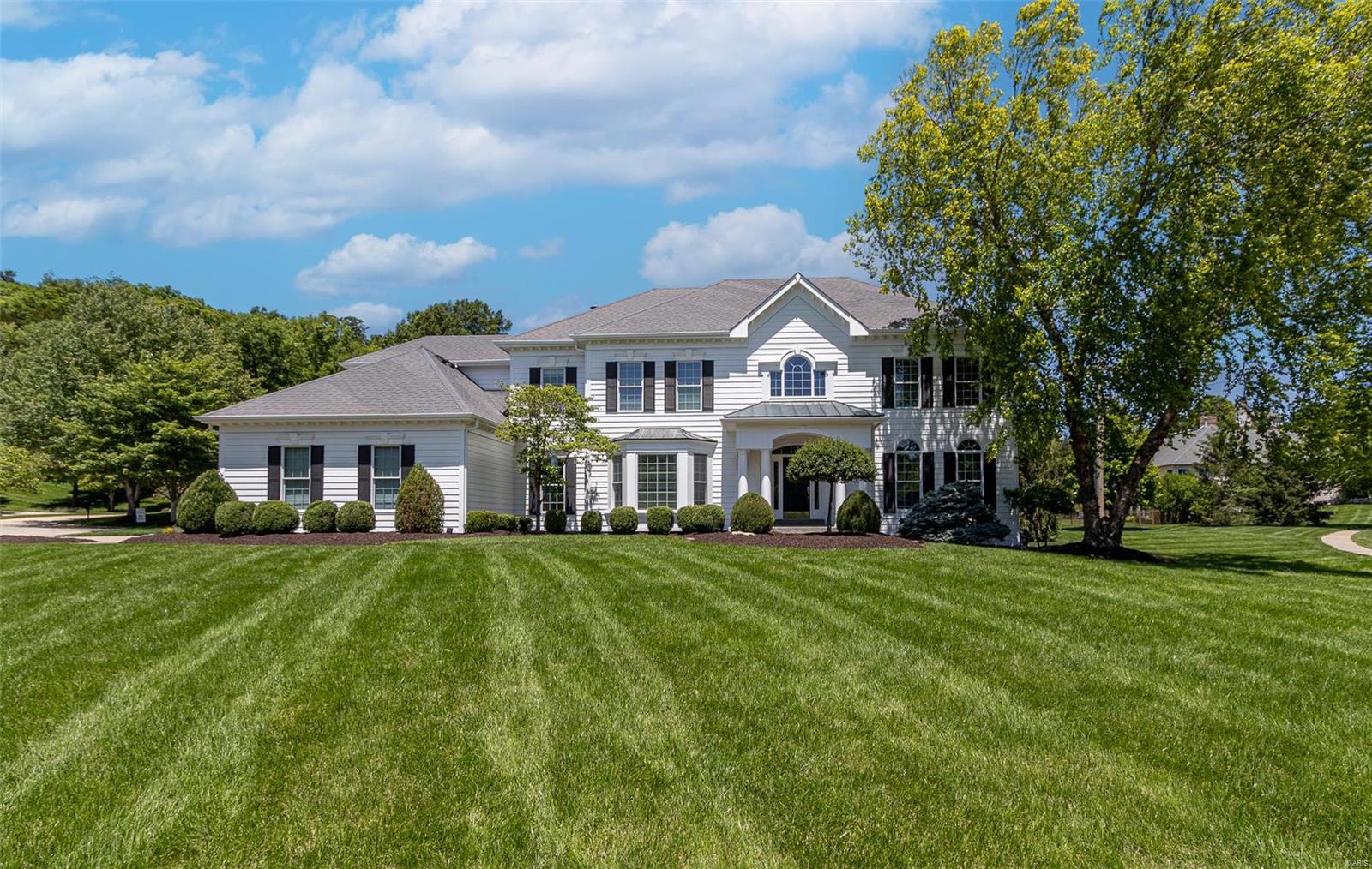 This beautiful colonial with landscaped lot and gorgeous salt water pool will make many memories! Gracious 2 story entry, living/office, lrg dining rm, with detailed millwork. Sunken great rm has built in bookshelves, gas fireplace, 6x5 wet bar and entrance to pool. fabulous kitchen, custom cabinets, granite counter, island, planning desk, dry bar, 2 pantries, 1-5x5, new slider door and window. 11x8 mud/laundry rm. 9ft ceilings, 6 panel doors, bay window, new carpeting on main, refinished HW floors & 1/2 bath. Second level Owners suite with WI closet, bath has whirlpool tub, step in shower, dble vanity, newer flooring. bedrm 2 has private bath, bedrm 3 &4 share Jack & Jill bath, large bonus rm could be playroom/office/5th bedrm. Bright sunny cheerful home. Entertaining or relaxing by  private Baker pool will be a favorite, resurfaced cooling pool deck,  copings surfaced. Pool cover and new vac. 3 side entry car garage. sprinkler system. 2 brand new water heaters just installed! Additional Rooms: Mud Room