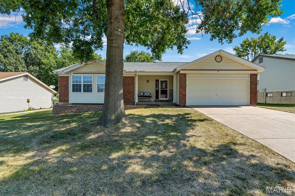 Step into this inviting 3-bed, 2-bath ranch in Carriage Hills, offering 1,467 sq ft of main-level living. The bright living room with a gas fireplace welcomes you first, featuring luxury vinyl plank flooring that sets a warm, cohesive tone throughout the main living spaces. Continue into the open breakfast room and kitchen, both with easy-care flooring and a functional layout perfect for everyday living.

Down the hall, you’ll find a full hallway bathroom and two comfortable secondary bedrooms, each with soft carpeting. The primary bedroom sits at the end of the hall, complete with its own full primary bathroom for added privacy.

The lower level offers a massive unfinished basement with tons of storage, giving you endless potential to expand or customize your space. Outside, enjoy an attached 2-car garage, an interior lot setting in the Francis Howell School District, and an engineered material deck—ideal for low-maintenance outdoor living and long-lasting durability.

A wonderful opportunity in a fantastic O’Fallon location — don’t miss this one!