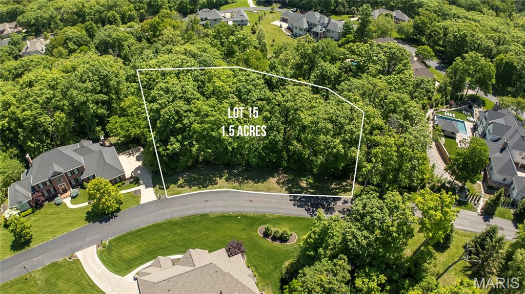 This is your opportunity to build your dream home in a truly picturesque setting! Beautifully landscaped entrance with the stone gatehouse and tranquil pond set the scene for one of the premier neighborhoods in West County!

Over 1 acre lot is set along the meandering streets with private, wooded lots and exquisite custom homes. This is a true retreat just minutes from the popular Chesterfield Valley. Bring your own plans and builder. All lots are also on public water and sewer ~ a bonus for the location and lot sizes!