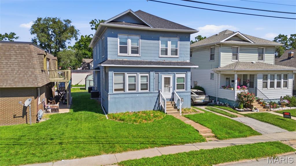 Spacious 3-bedroom, 2-bath home offering approximately 1,985 sq ft of living space and plenty of potential for the right buyer. Previously configured as a duplex with separate living areas on the main and upper levels, the property features a unique layout that may appeal to investors, renovators, or buyers seeking flexible space. Major updates include a roof approximately 1 year old and an HVAC system approximately 2 years old. The home is in need of repairs, cosmetic updates, and overall TLC, and is being sold strictly AS-IS. Seller will make no repairs, inspections are for buyer's informational purposes only. Ideal for buyers looking to add value through renovation. Buyer to independently verify all MLS information.