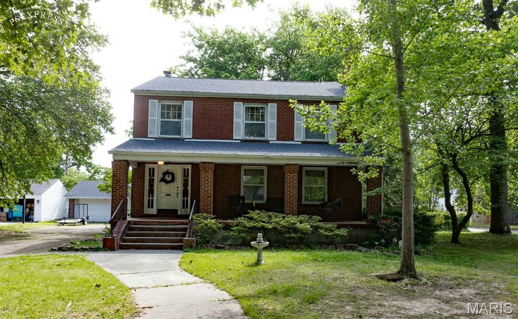 Step into the charm of yesterday with the comfort of today in this stunning brick beauty. Located in a very desirable area, this 3-bedroom, 1.5 bath home offers timeless character throughout with beautiful hardwood floors, graceful archways, French doors, cozy fireplaces, and inviting covered porches. A possible 4th bedroom in the basement provides extra flexibility for guests, office space, or hobbies. Brand-new roof installed just weeks ago! Full of warmth, charm, and endless potential-- this home is simply waiting for it's next chapter.