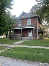 This two story all brick home has three bedrooms and two full baths. Currently tenant occupied, this investment opportunity is ready to go. Large flat lot.
