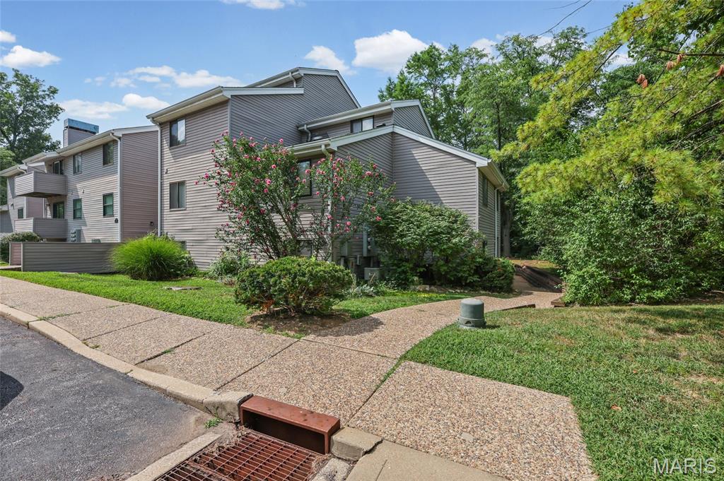 High Demand West County Neighborhood close to Queeny Park plus all of your dining & retail errands around the corner. This TWO bedroom condo is waiting for it's next owner. This is a ground floor unit that overlooks pool and community entertainment area.   Large primary bedroom with plenty of room. Bath suite has counter height cabinets,  newer cabinet, lighting & fixtures. Washer, dryer & fridge to stay. Sliding door off your family room leads to your aggregate patio which is steps from shared BBQ station. Located within the Parkway school district & minutes from Queeny Park. This is a very secluded community - you've probably driven by it & never noticed it was there. Perfect spot & so easy To Show.