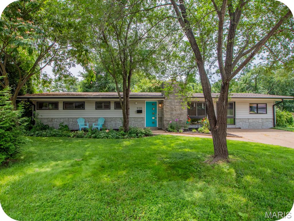 Open house Sun. 6/28 from 1-3pm. Welcome to 920 Volz Drive, a picture-perfect corner lot in Crestwood's Ridgewood neighborhood, known for its mid-century character, located in the Lindbergh School District, with easy access to shopping, dining and everyday conveniences. This remodeled ranch home is move-in ready with a two year old roof, updated kitchen and bathroom, and newer flooring and lighting throughout. Walking inside, the vaulted ceilings showcase a surprisingly flexible open layout designed for those who love to gather, with four distinct living zones; a fireplace sitting nook, a secondary gathering space, a dedicated dining area, and a main living room, all of which flows into a bright updated kitchen with quartz counters, stainless steel appliances, generous cabinet space and a breakfast bar for additional seating. Sliding glass doors lead to a large patio, ready for summer cookouts, and a fenced back/side yard, with plenty of room for the dogs or kids to play (and don't miss the shed for additional storage). Single-level living means everything is right where you need it, with three bedrooms, an updated full bathroom with gorgeous sage green subway tile, and a convenient main floor laundry room. A versatile bonus room adapts easy to a home office, gym, art studio, or a fourth guest bedroom. With mature trees, including a weeping willow and towering pine, and a native garden, some houses just feel like home before you've even stepped inside. Schedule a tour with your favorite Realtor today.