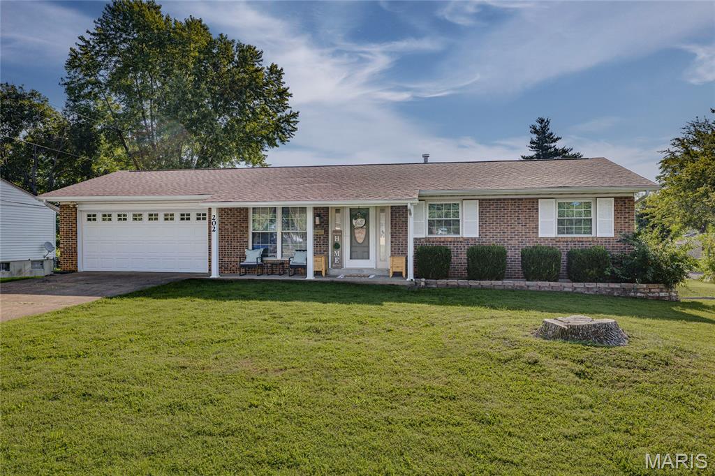 Check out this move-in ready 3 bed, 2 bath ranch sitting on a great corner lot! Inside you'll find fresh paint, new flooring and new light fixtures throughout, plus a brand new HVAC system! The partially finished basement offers extra space for a family room, home office or whatever fits your needs. Outside features a large covered deck, fenced-in backyard, and a spacious 2-car garage with plenty of room for parking and storage. Can't wait to call this one home? Schedule your showing today!