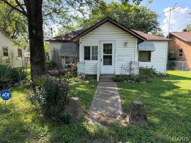 Attention investors!  This 2 bedroom, one bath home is located in the heart of town and has great rental potential.  Sold as-is.