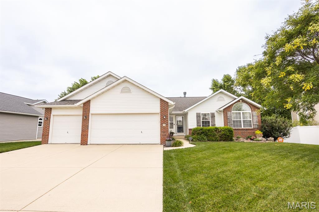 Welcome home to this beautifully maintained, move-in-ready ranch offering an incredible 3,040 total square feet of finished living space! From the moment you step inside, you’ll love the light-filled, open-concept design that seamlessly connects the main living areas—perfect for both daily life and effortless entertaining. The heart of the home shines with brand-new, sleek kitchen countertops and durable luxury vinyl plank flooring that flows beautifully through the main level. The main floor features 3 comfortable bedrooms and 2 full baths, including a private primary suite. Downstairs, the home truly doubles its appeal with a massive, fully finished basement boasting a huge recreation room, a sprawling 4th bedroom with its own full bath, and an additional versatile bonus room perfect for a home office, gym, or play space. Step out back to your private outdoor oasis featuring a large concrete patio ideal for summer BBQs, overlooking a fully fenced-in backyard that offers plenty of space and security. Premium extras include a spacious 3-car attached garage, a newly added water softener system for ultimate home comfort, and a brick veneer front accentuating great curb appeal. Located in a desirable Troy neighborhood within the Triad School District, this home perfectly blends space, style, and a fantastic location.