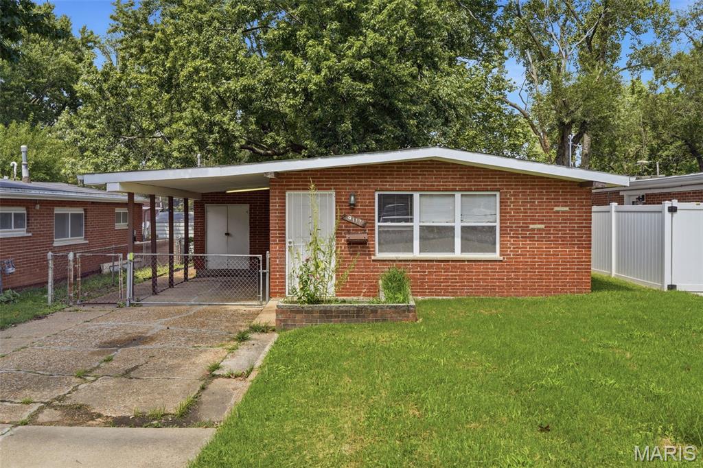 Don't miss this charming 1-story home featuring 2 bedrooms, a 1-car attached carport, and a comfortable layout ready for your personal touch. Enjoy relaxing on the back porch overlooking the fenced backyard, offering plenty of space for outdoor entertaining, gardening, or pets. The functional floor plan provides comfortable everyday living with endless possibilities to make it your own. Whether you're looking for your first home, downsizing, or adding to your investment portfolio, this property is full of potential. Schedule your showing today!