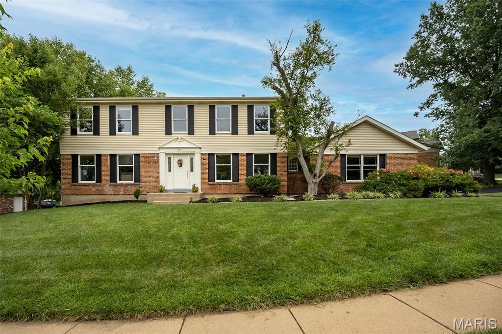 Hurry and see this beautiful two story home in Chesterfield - it will check all of your boxes! This traditional, center hall plan, two story home in the Green Trails neighborhood sits on a quiet street with super quick access to highways, restaurants and shopping.  On over a half acre, 357 Cooperstown sits wonderfully on its lot and offers a lot of privacy on either side and in the rear of the home. Inside you will enjoy just over 3,700 square feet of living among the main, upper and lower levels. The main level offers the traditional dining room, living room/office, family room with wood burning fireplace, kitchen with center island, main level laundry and mud room. The large primary suite offers its owners a retreat with a sitting area and dedicated fireplace, walk in closet and private bath. The other three bedrooms and bath round out the second level.  The lower level is finished with a large recreation area, sleeping room, and plenty of storage.  The oversized, side entry garage has plenty of storage space as well.  Make this one yours - it will not be on the market long.  Showings start 7/11/2026.  Open House Sunday 7/12/2026 from 1-3 pm.