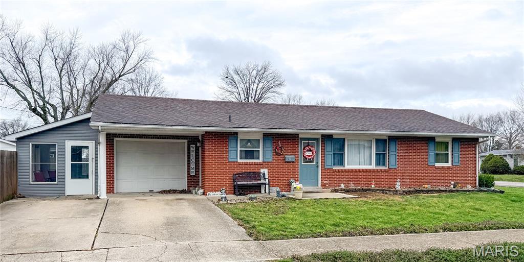 Cute, comfortable, and easy living all on one level!  This charming brick ranch sits on a corner lot and offers an open layout with some newer flooring throughout. The sunroom/enclosed porch is a great bonus space that is perfect for relaxing and leads right out to the large fenced in backyard.  With 2 bedrooms, 1 1/2 bathrooms, and an attached garage, this property is a great option for first time home buyers or anyone ready to downsize.  A great place to start your next chapter!