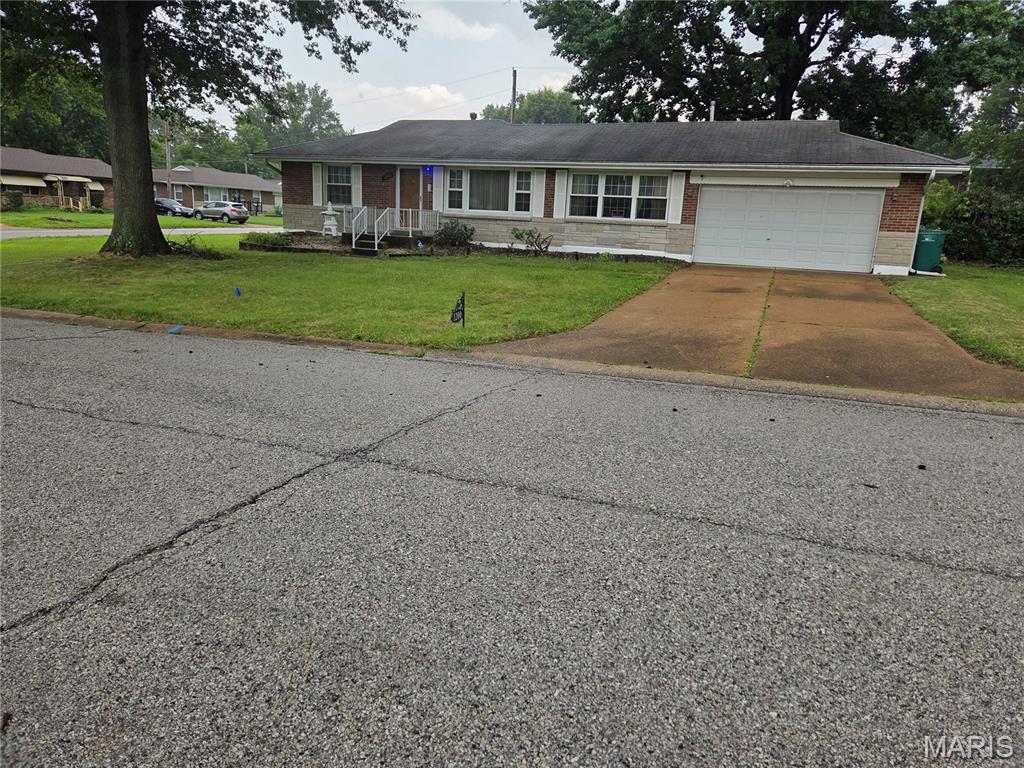 Home is located in a well kept neighborhood on a corner lot.     This is an all-brick gem with a 2-car garage.  This home is being sold "as is" so your buyers can update it to their own taste.    Broker owner.
