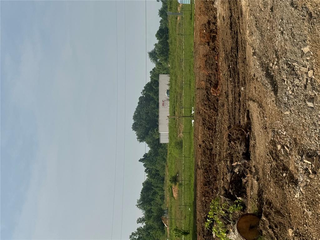 Unlock the potential of this exceptional .75 +/- acre vacant lot ideally positioned on a rapidly developing Kanell Blvd and easy access to Highway 67.