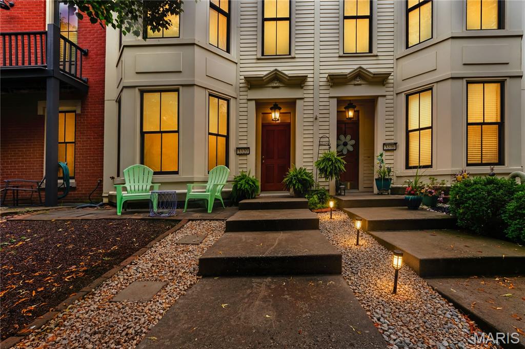 Ready for sunshine, relaxation, and an easygoing lifestyle? Welcome to New Town in St. Charles! A charming, small-town community designed for walkability and connection. Step outside your front door and enjoy expansive green space in the park across the street or take a short four-minute stroll to the town center, where you’ll find an amphitheater, popular dining spots, a grocery store, and unique local shops. This inviting three-story townhouse boasts beautiful curb appeal, including a front garden space, decorative black fencing, and convenient street parking for guests. Inside, the open-concept floor plan creates a bright and airy feel, with seamless flow between the kitchen, dining, and family room. Step through the kitchen door onto your private deck, featuring brand-new decking (June 2026) Upstairs, the spacious primary suite offers a walk-in closet and private bath, alongside a second bedroom with its own ensuite. An upper-level laundry area adds everyday convenience. On the main level, you’ll find a versatile third bedroom or private office, plus an oversized one-car garage (19x16). Recent updates including fresh paint, new carpeting, and new deck boards, all completed in 2026, make this home truly move-in ready. Located in the heart of New Town, residents enjoy resort-style amenities such as sparkling pools, a 700-foot lazy river, scenic lakes and canals for fishing and water activities, plus volleyball and pickleball leagues, dining, shopping, and more. It’s a vibrant, active community designed for the lifestyle you’ve been looking for.