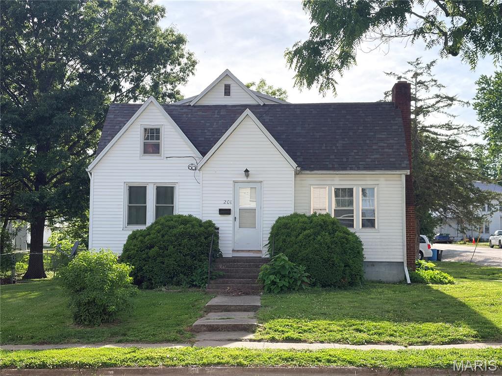 Charming 4-bedroom, 1.5-bath home situated on a spacious corner lot in Paris Missouri! This cute property features a full basement, detached 2-car garage, and a fenced backyard perfect for pets, kids, or entertaining. Offering plenty of space inside and out!