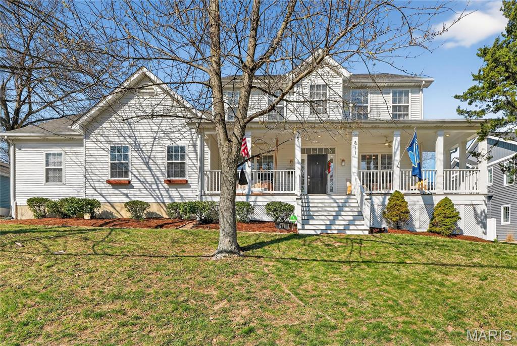 Expansive 1.5 Story Home in Ideal Kirkwood Location on Desirable street with In Ground Pool. Spacious Home features over 5,000 sq ft of total living space. Inviting Front Porch with charming swing greets you upon arrival.  Two Story Entry foyer is flanked by formal dining Room and Living Room.  Stylish White Oak floors run throughout main level.  Spacious Main floor primary suite walks in Primary bath with double vanity and separate tub and shower.  Large walk in primary closet. Open Floor Plan Family Room with Gas fireplace is great hang out spot. Dream Kitchen was totally renovated and reconfigured with center island, custom cabinetry, stainless steel appliances including beverage fridge and 5 burner gas range, and cambria quartz tops! Breakfast Room with bay window walks out to in ground pool with fenced in yard. So much fun for the Family! Upstairs features 3 additional bedrooms.  Bed #2 and #3 share renovated jack-n-Jill bath setup. Bed #4 is next to full bath.  Spacious upstairs office is perfect work from home space with sliding barn door for privacy.  Finished Lower level has the BEST BAR in all of Kirkwood.  Welcome to “Lloyd’s”.  20 ft wood top bar with enough seating for 7 stools.  Full appliances including dishwasher, both beverage and standup fridge, and kegerator! Let the good times roll! Tons of extra space in LL including sleeping area and workout room.  Plus another full bath.  Incredible Lower level! All of this plus 3 car rear entry garage.  Short walk to Keysor Elementary and KWD Park. Rare Opportunity with Main Floor Primary, Designer Kitchen, In Ground Pool, Amazing Lower Level and Lots of Room for the Family.  This Home is waiting for the next Fun Family to call it their own!