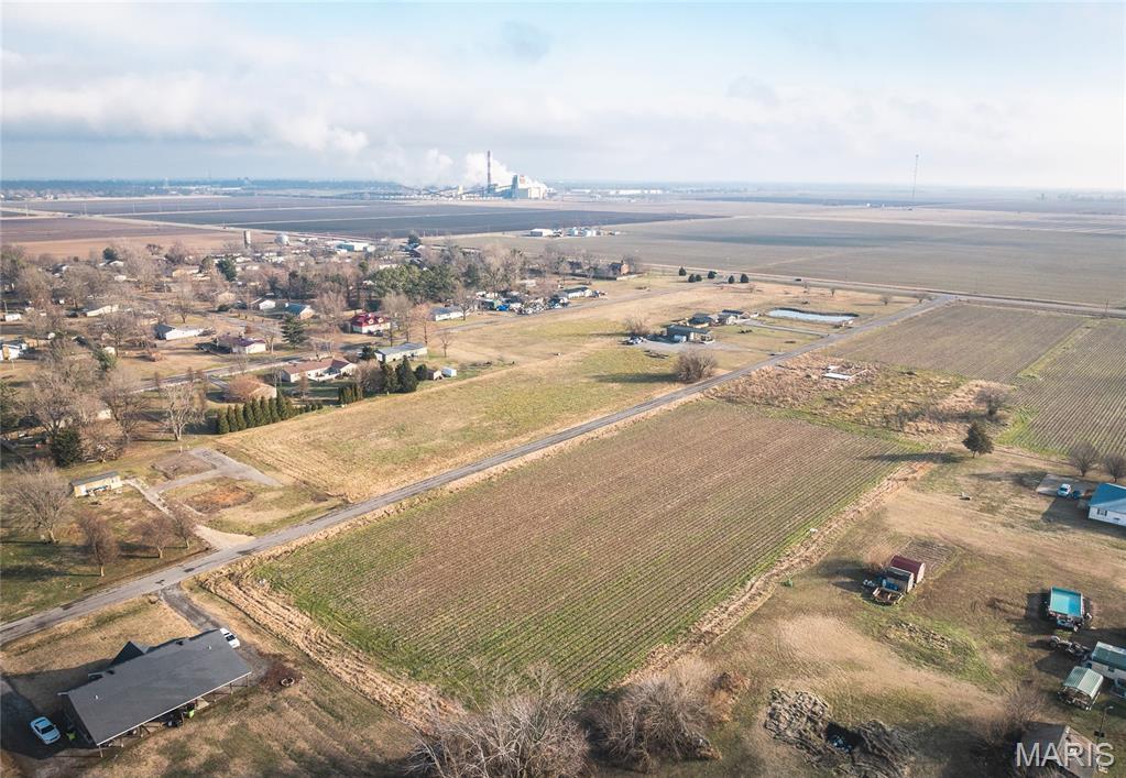 8.92 +/- acres of row-crop farmland with development potential located just outside Sikeston, Missouri. Property includes approximately 8.92 acres of tillable cropland plus platted building lots. Ideal for farmland investors, developers, or buyers seeking agricultural income, residential development, or long-term land investment. Level, open ground with easy access to Sikeston, highways, and local amenities. Multiple use and exit strategies available.