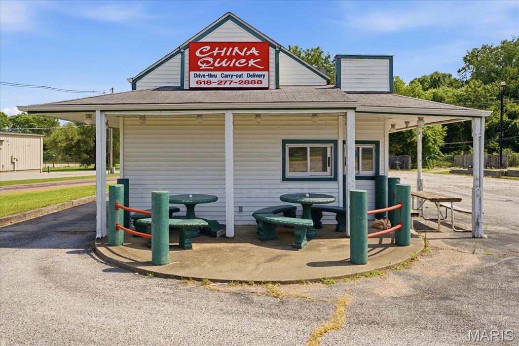 Here is a great opportunity to purchase a prime piece of commercial real estate directly across from Belleville East High School. This building includes equipment from the previous restaurant.  The building was operated for many years as a Chinese restaurant with pedestrian window or inside pickup along with a drive thru.  This setup is ideal for another restaurant or coffee shop.  There is plenty of parking and the location has great visibility on the highly trafficked Carlyle Avenue.  Property is near BTHS East, SWIC and a pass by for those traveling to SAFB. The building, land, and equipment or being sold for one low price.  This popular establishment is ready for you to add your own touches and make your dream come true.  This property is zoned C-2 heavy commercial, all utilities available, very visible, established area, and located around other retail businesses.  Be sure to set up a showing today! All information to be verified by buyer or buyer's agent.