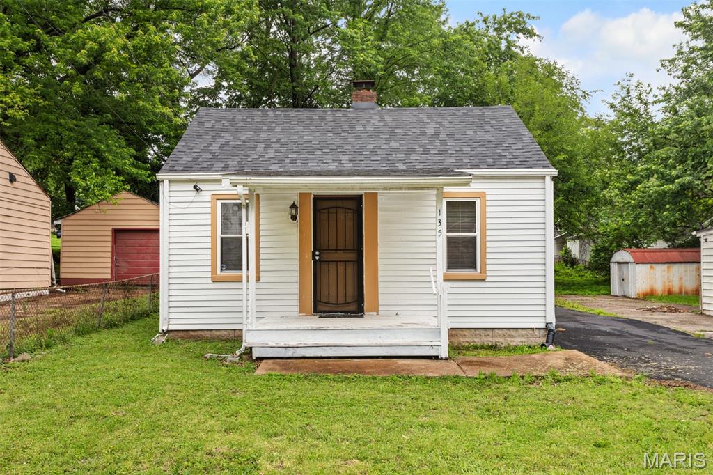 Adorable 2 bedroom, 1 bathroom move-in ready home! This home welcomes you into the living room space boasting tons of cozy vibes with the neutral tones throughout. The eat-in kitchen is complete with plenty of cabinets and counter space for all your storage needs. A convenient full bathroom is located just right past the kitchen with a pedestal sink, full tub/shower combo and built in shelving. One bedroom is located to the right of the living room, which could also be used as a home office, library or den. The second bedroom has been nicely renovated with a vaulted ceiling, track lighting and tons of windows bringing in natural light. There is a large walk-in closet offering tons of space. Onto the exterior you will enjoy having the long driveway that extends to the backyard that features a large patio area. There is a large shed in the backyard for all your extra storage essentials or make into a nice hobby workshop. A new roof was installed in 2025. Be sure to make your appointment today to come see all the potential this cozy home has to offer!