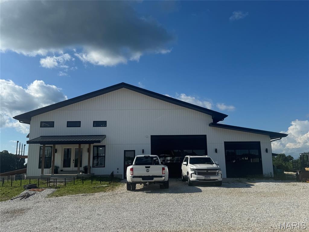 Checkout this C1 Commercial Zoned property in Warren County right on Highway 47 at the corner of Hwy 47 and Quarry Rd. This 7.25+/- acre parcel includes 2 buildings with a combined total of 18,312 sq ft under roof. The first building is approximately 5,212 sq ft and includes Office space, Living Space, and 2 large pulls through bays overlooked by an inspection balcony. Each Bay is 60' long one bay is 27' wide and the other is 16' wide. Each bay has pull through garage doors. The larger bay has a set of 12' tall x 16' wide garage doors, and the second bay has two 10' x 10' garage doors. This building has been used to build, fabricate, and store material needed for construction. The second building is approximately 13,100 sq ft.  The original plan was to provide space for a large fabrication shop and a tool and die facility. This large building has a lot of possibilities. It is under roof and can be finished specific to your company needs.