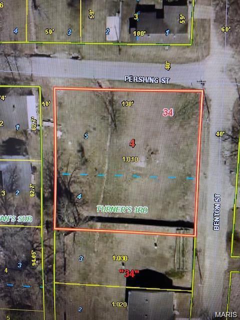 Nice corner city lot with public water and sewer hookups nearby, as well as electric. This lot is ready for a new home.