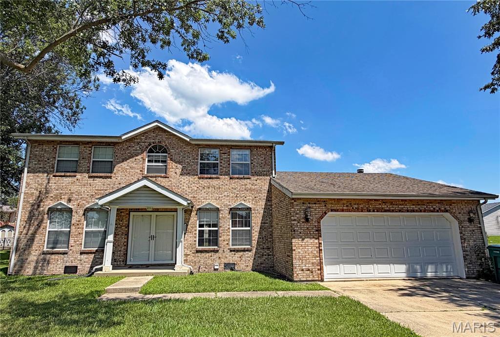 Appealing two story in popular Fox Glenn subdivision.  Four bedroom gem with newer flooring & interior paint, updated kitchen with island and stainless appliances, the breakfast nook walks out to a deck and the level rear yard.  An oversized family room offers a wood burning fireplace flanked by bookcases. There are  formal living and dining rooms plus a main level laundry with access to the double attached garage with opener.  Upstairs you find the master suite with walk in closet and a pocket door to a private bath which offers a garden tub and separate shower with brand new door.  Three additional bedrooms and a full bathroom complete the upper floor. Updates include a newer roof, HVAC, light fixtures and stained six panel doors plus wood wrapped windows.  Terrific location near Scott Air Force Base, shopping, restaurants and I-64 exits.