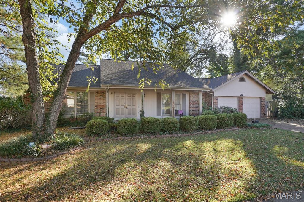 Don't miss this rare opportunity to own a spacious ranch home in the Lovely Somerton neighborhood of Creve Coeur in the Parkway School District. This charming 4-bedroom, 2-bath residence offers over 1,900 sq ft of thoughtfully designed living space. The bright and airy living room features soaring vaulted ceilings and an abundance of natural light, creating a welcoming atmosphere. The updated kitchen is a true highlight with custom cabinetry, stainless steel appliances, a stylish tile backsplash, and plenty of counter space for all your culinary needs. The main floor includes 4 generously sized bedrooms and 2 full bathrooms, including a large primary suite with its own en-suite bath for added convenience and privacy. The expansive finished basement offers a versatile recreation room, ideal for entertaining, a home gym, or a media room, providing endless possibilities.  Additional features include a 2-car garage, mature trees, and a peaceful, private setting. Recent updates include a new roof (2020), new carpeting, and fresh paint throughout the main floor (2025). This move-in ready home is located just minutes from shopping, dining, and major highways.